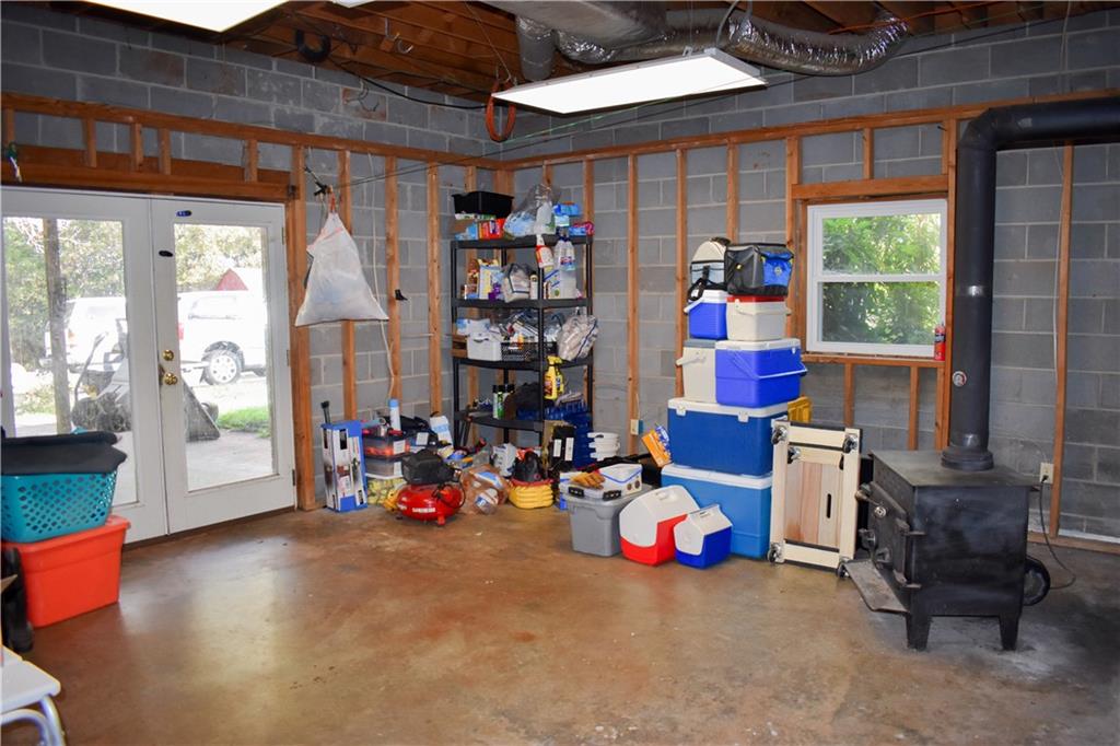 6882 Cowan Mill Road Winston, GA 30187 - Photo 31 of 50 a play room with toys