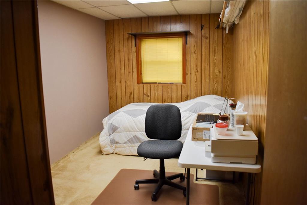 6882 Cowan Mill Road Winston, GA 30187 - Photo 35 of 50 a bathroom with a sink and a mirror