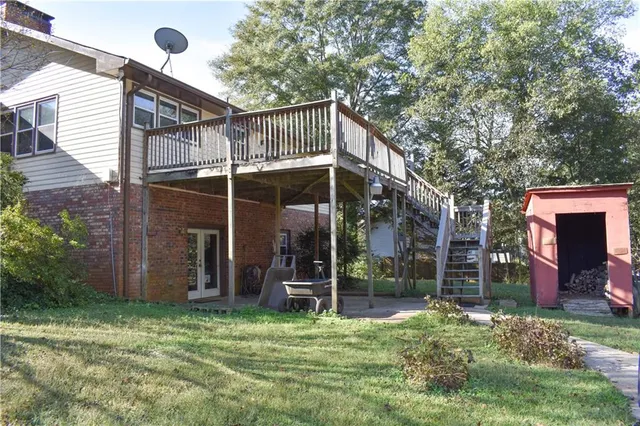 a backyard of a house with lots of green space