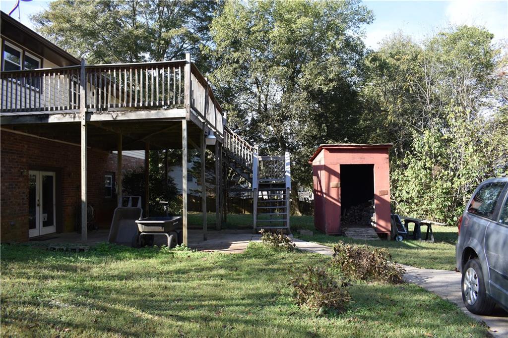 6882 Cowan Mill Road Winston, GA 30187 - Photo 5 of 50 a front view of a house with a yard