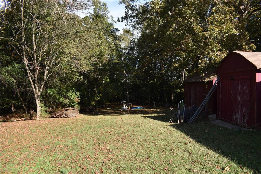 6882 Cowan Mill Road Winston, GA 30187 - Photo 7 of 50 a view of outdoor space with trees