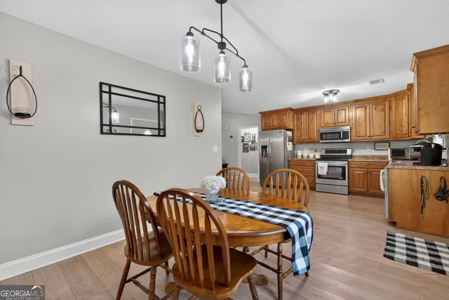 a view of a dining room with furniture