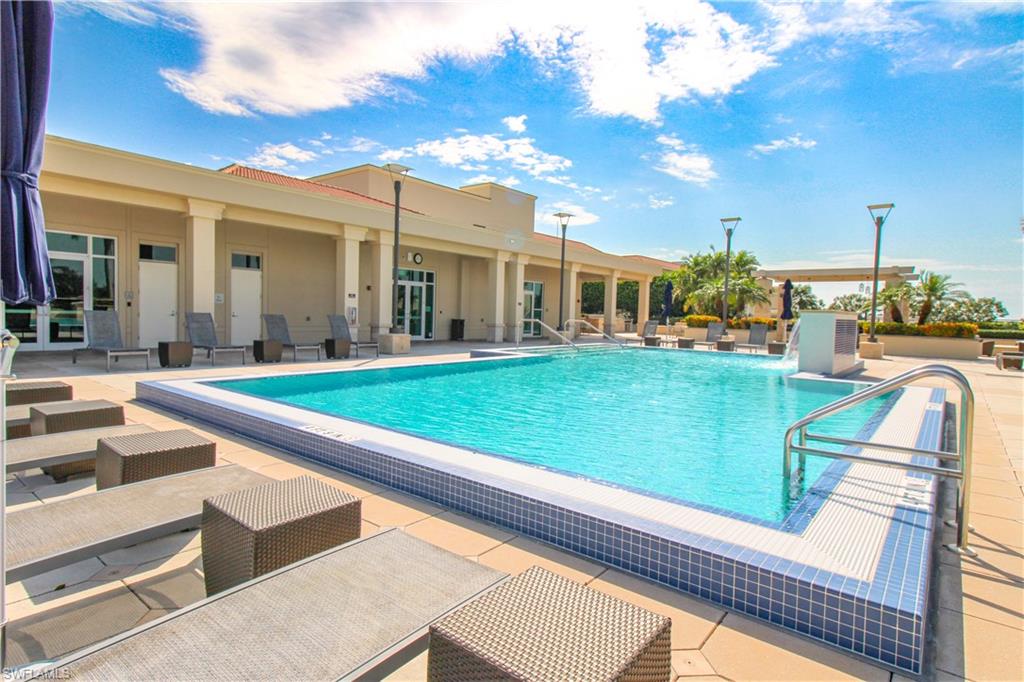 9123 Strada Place, Unit 7410 Naples, FL 34108 - Photo 2 of 50 View of pool featuring a patio