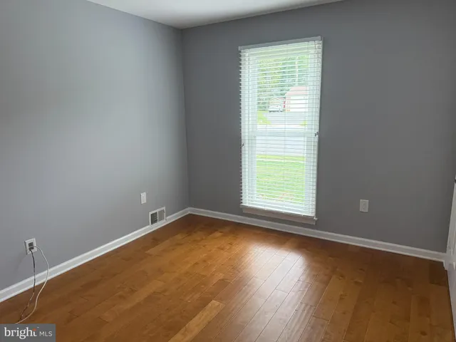 a workspace with furniture and window