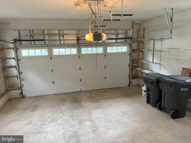 a view of balcony with wooden fence