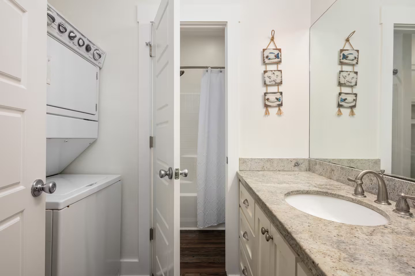 845 O' Neil Road Port Bolivar, TX 77650 - Photo 14 of 27 a bathroom with a granite countertop sink a mirror and shower