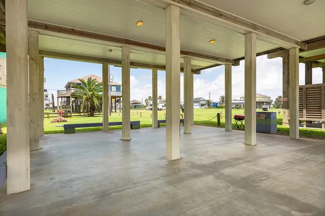 a view of a room with floor to ceiling windows