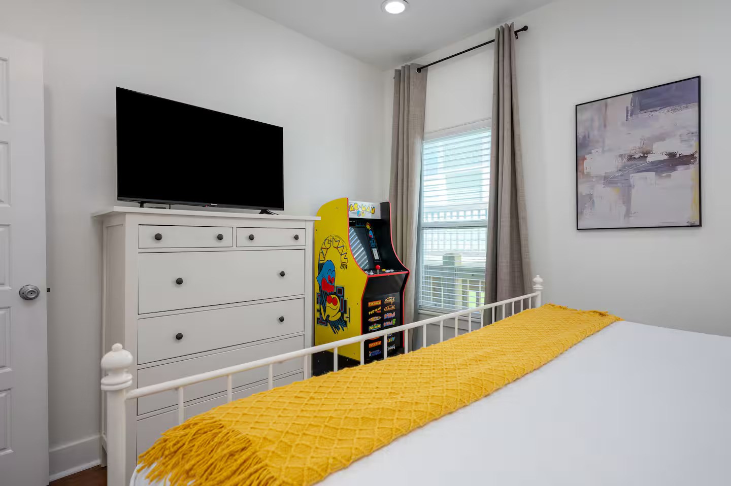 845 O' Neil Road Port Bolivar, TX 77650 - Photo 10 of 27 a bedroom with a bed and a flat screen tv