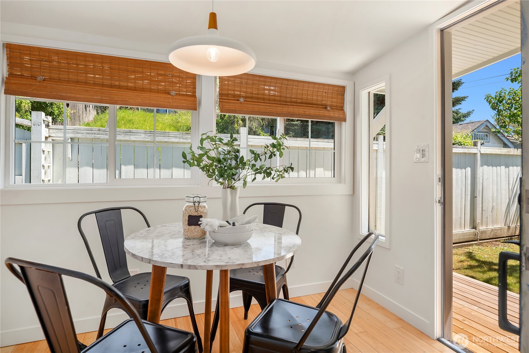 5648 38th Avenue Southwest Seattle, WA 98126 - Photo 12 of 40 a view of a dining room with furniture window and outside view