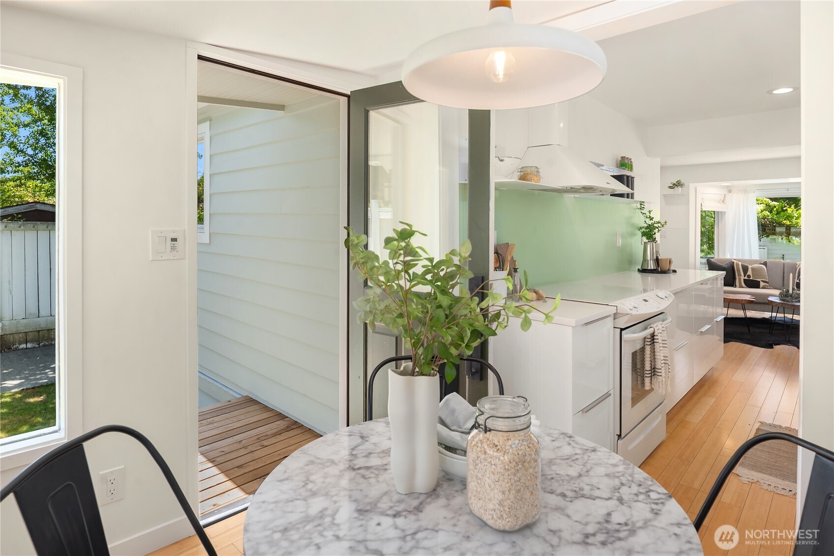 5648 38th Avenue Southwest Seattle, WA 98126 - Photo 13 of 40 a living room with furniture and a potted plant
