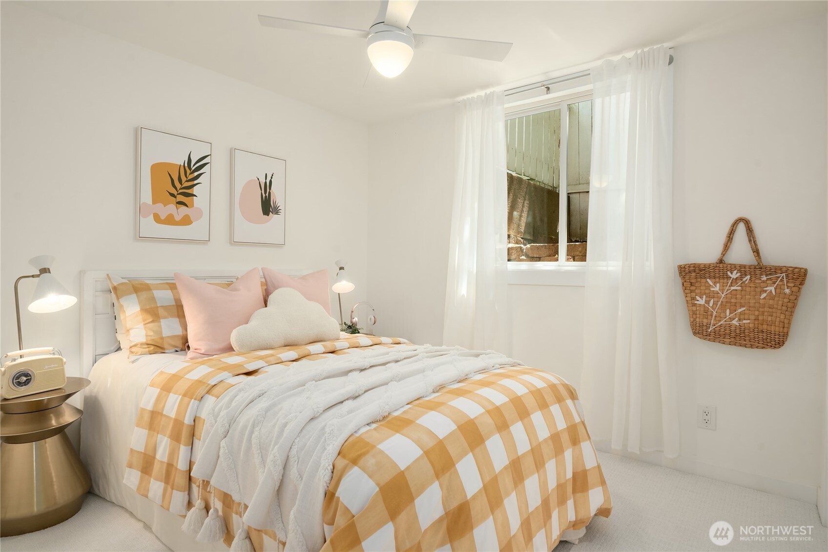 5648 38th Avenue Southwest Seattle, WA 98126 - Photo 18 of 40 a bedroom with a bed and a painting on the wall