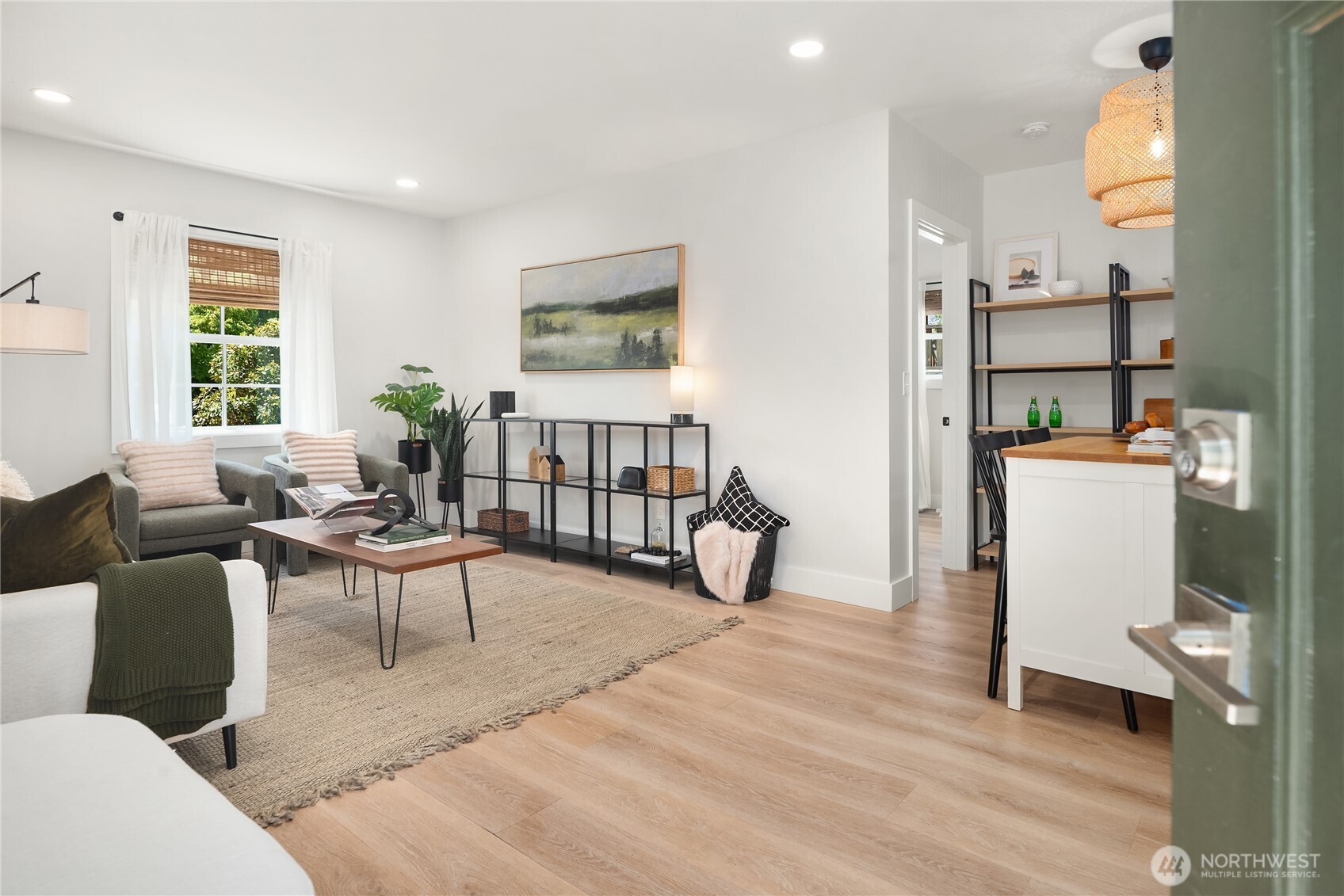5648 38th Avenue Southwest Seattle, WA 98126 - Photo 25 of 40 a living room with furniture a window and a table