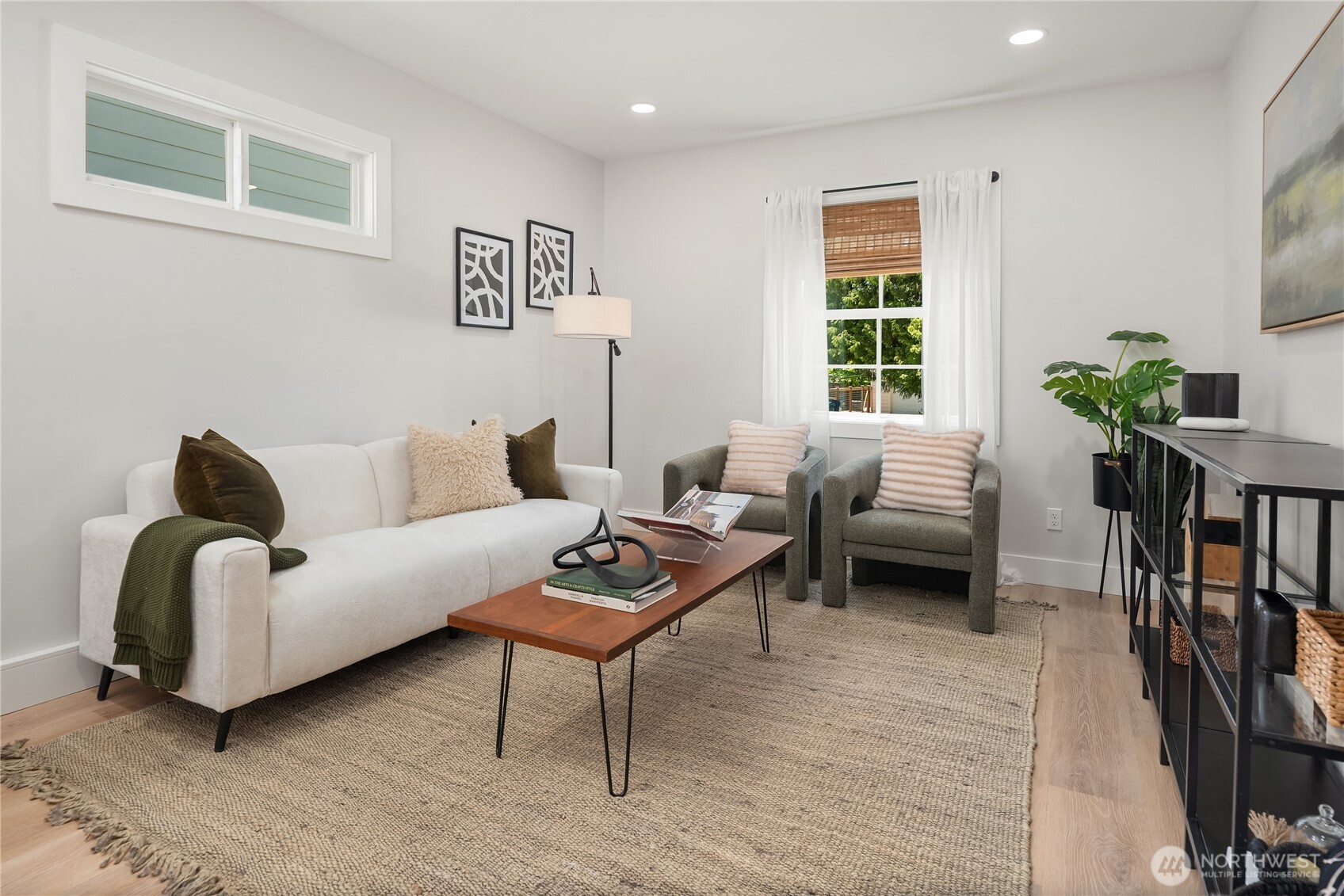5648 38th Avenue Southwest Seattle, WA 98126 - Photo 27 of 40 a living room with furniture and a window