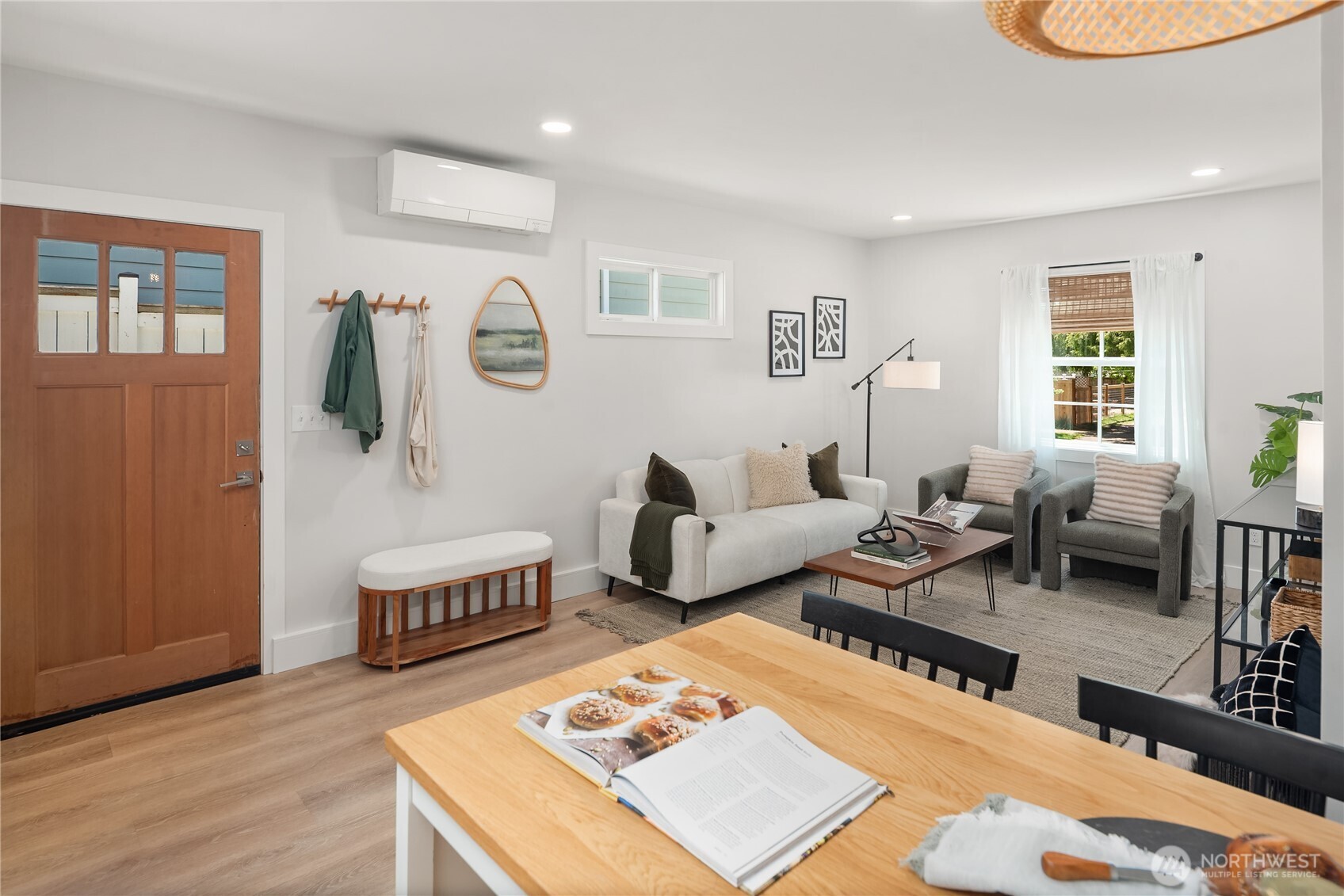 5648 38th Avenue Southwest Seattle, WA 98126 - Photo 29 of 40 a living room with furniture a rug and a window