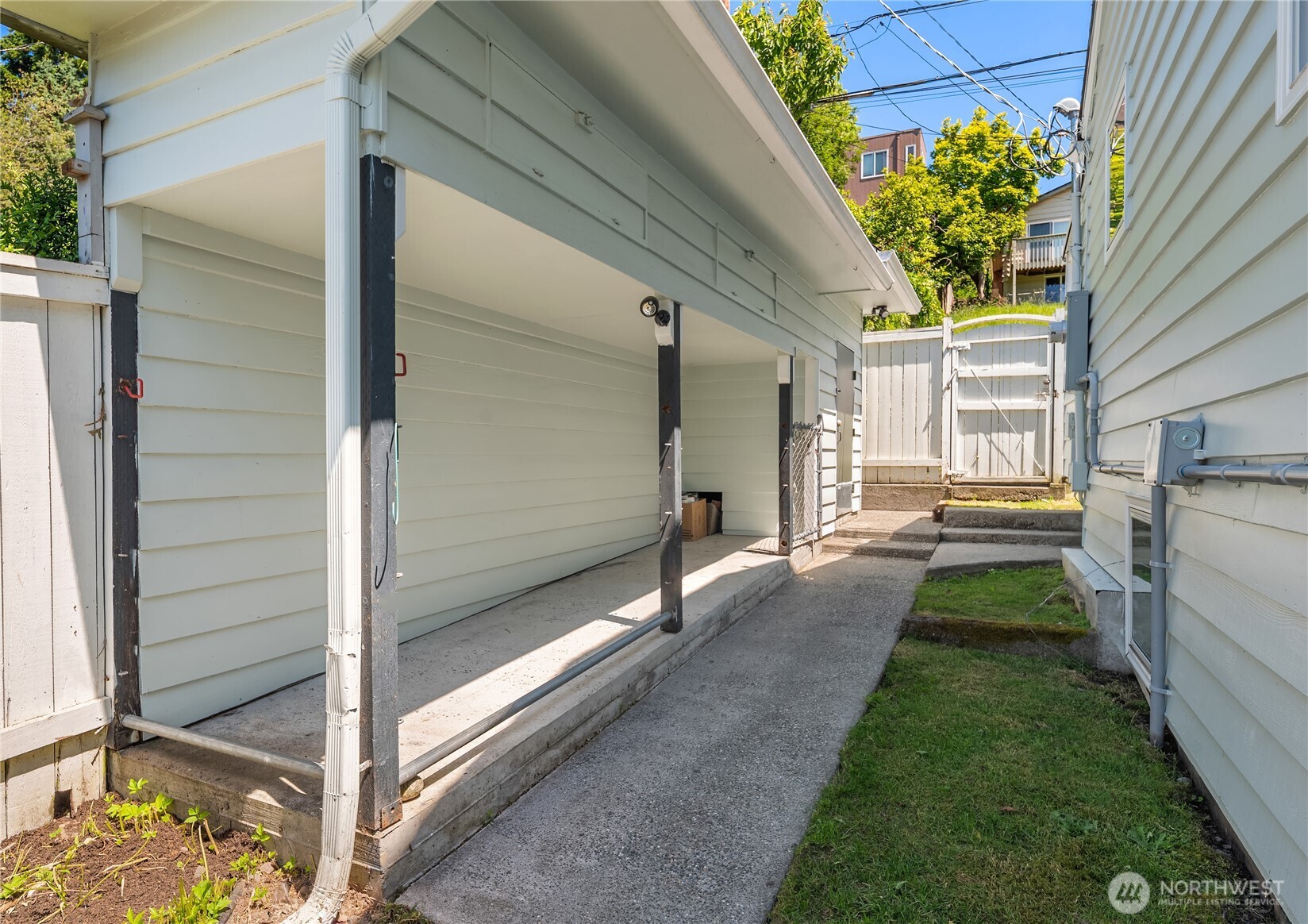5648 38th Avenue Southwest Seattle, WA 98126 - Photo 37 of 40 a view of a pathway of a house