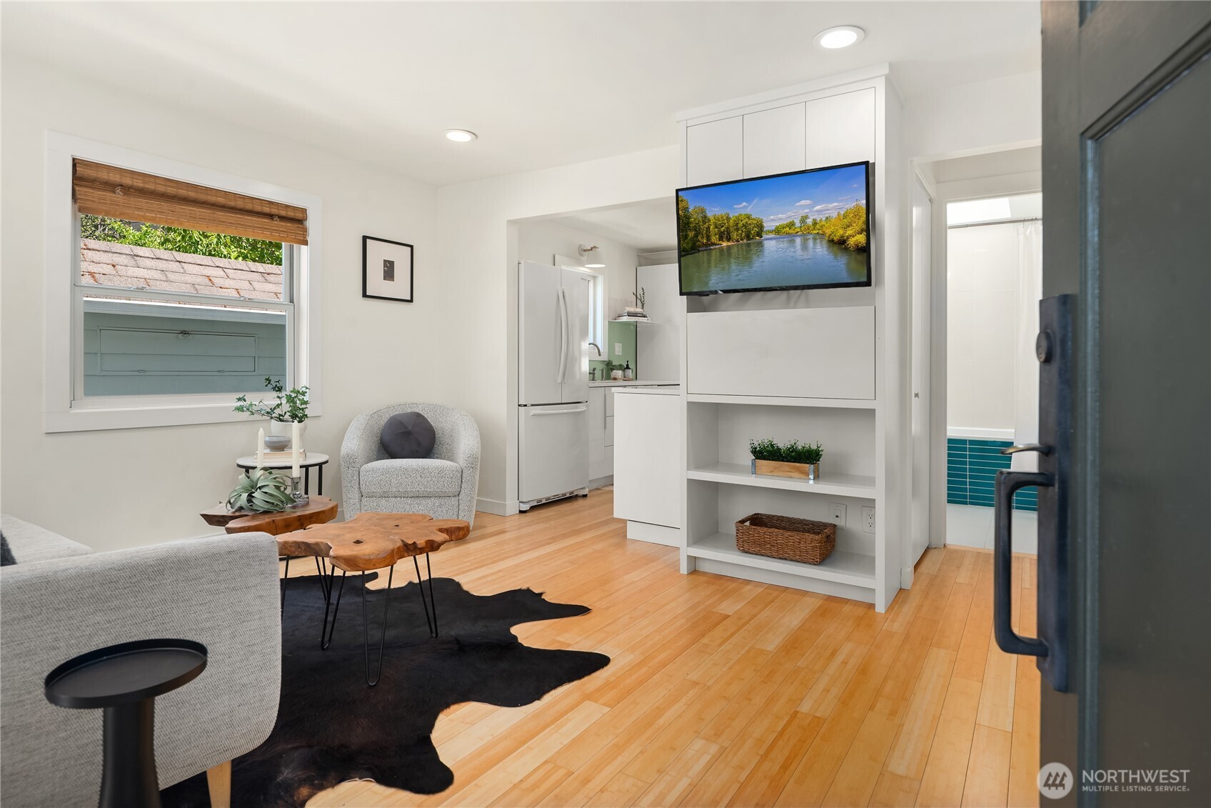 5648 38th Avenue Southwest Seattle, WA 98126 - Photo 5 of 40 a living room with furniture fireplace and flat screen tv