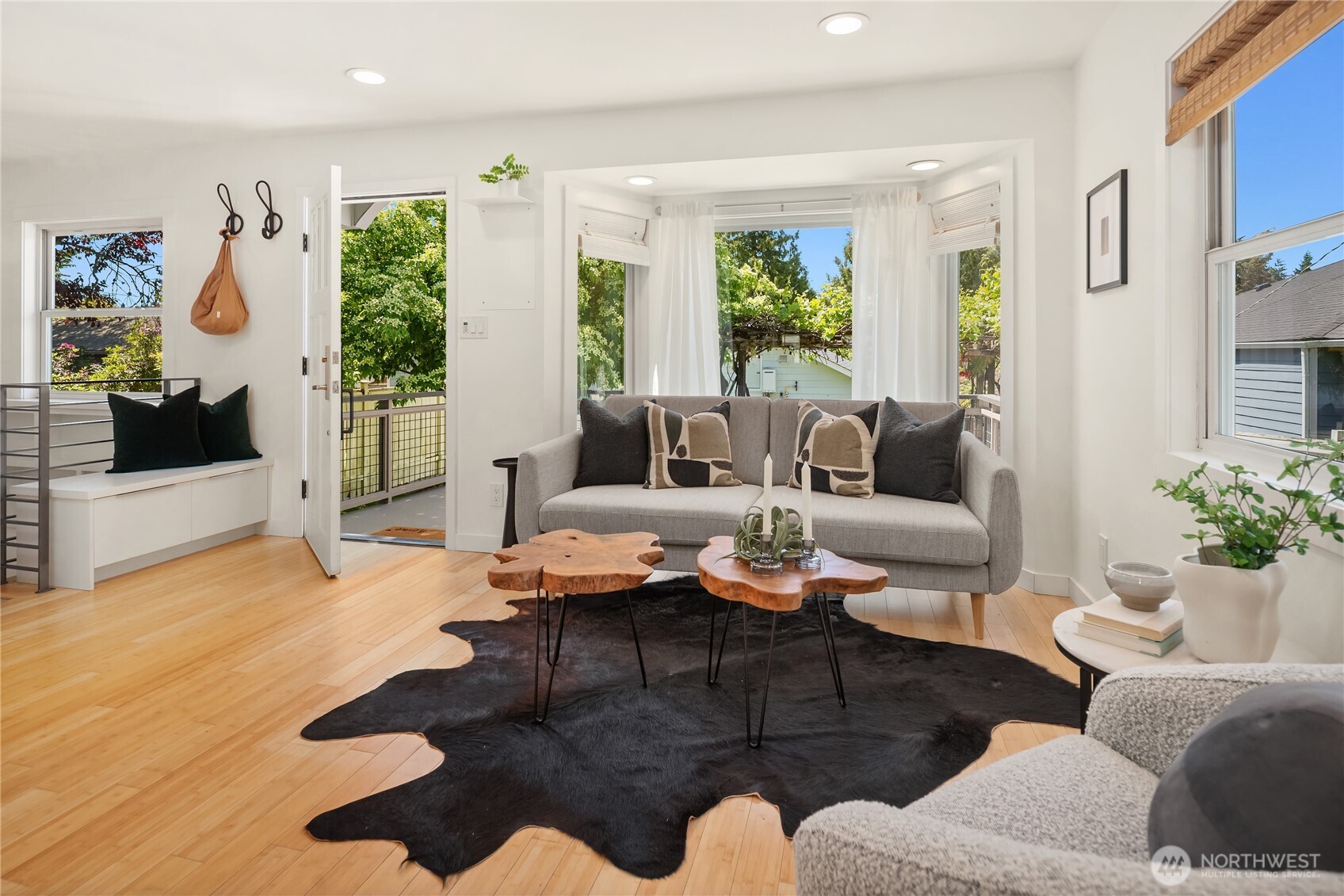5648 38th Avenue Southwest Seattle, WA 98126 - Photo 7 of 40 a living room with furniture or couch and a flat screen tv