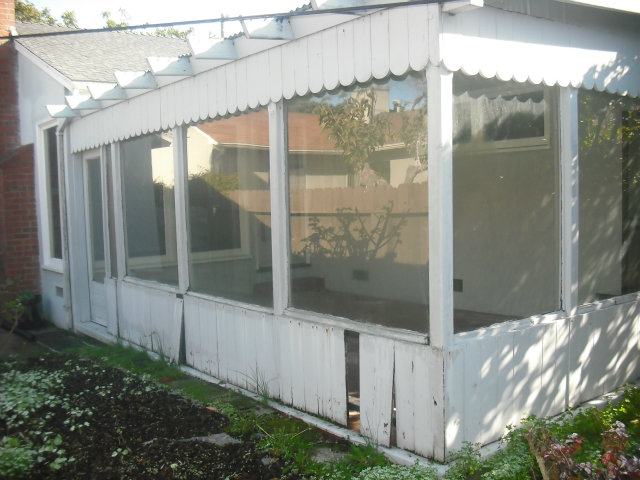 423 Dwight Road Burlingame, CA 94010 - Photo 3 of 11 a bathroom with a glass shower door