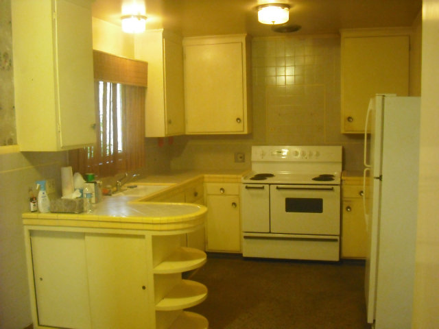423 Dwight Road Burlingame, CA 94010 - Photo 4 of 11 a bathroom with a sink and a mirror