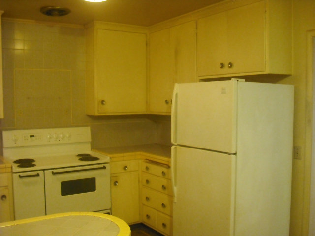 423 Dwight Road Burlingame, CA 94010 - Photo 5 of 11 a bathroom with a sink and a refrigerator