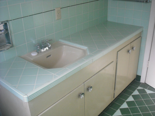 423 Dwight Road Burlingame, CA 94010 - Photo 6 of 11 a bathroom with a sink and a shower