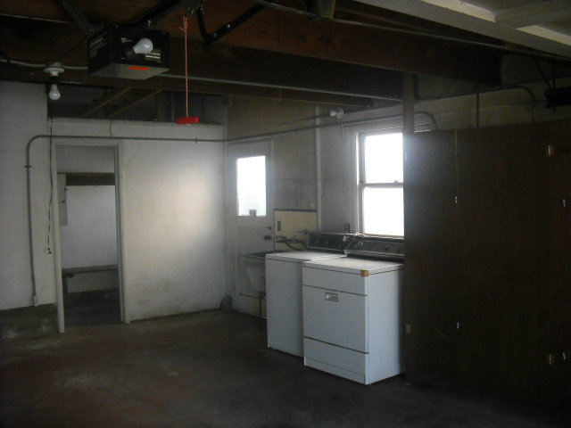 423 Dwight Road Burlingame, CA 94010 - Photo 10 of 11 a room with a sink cabinets and utility room