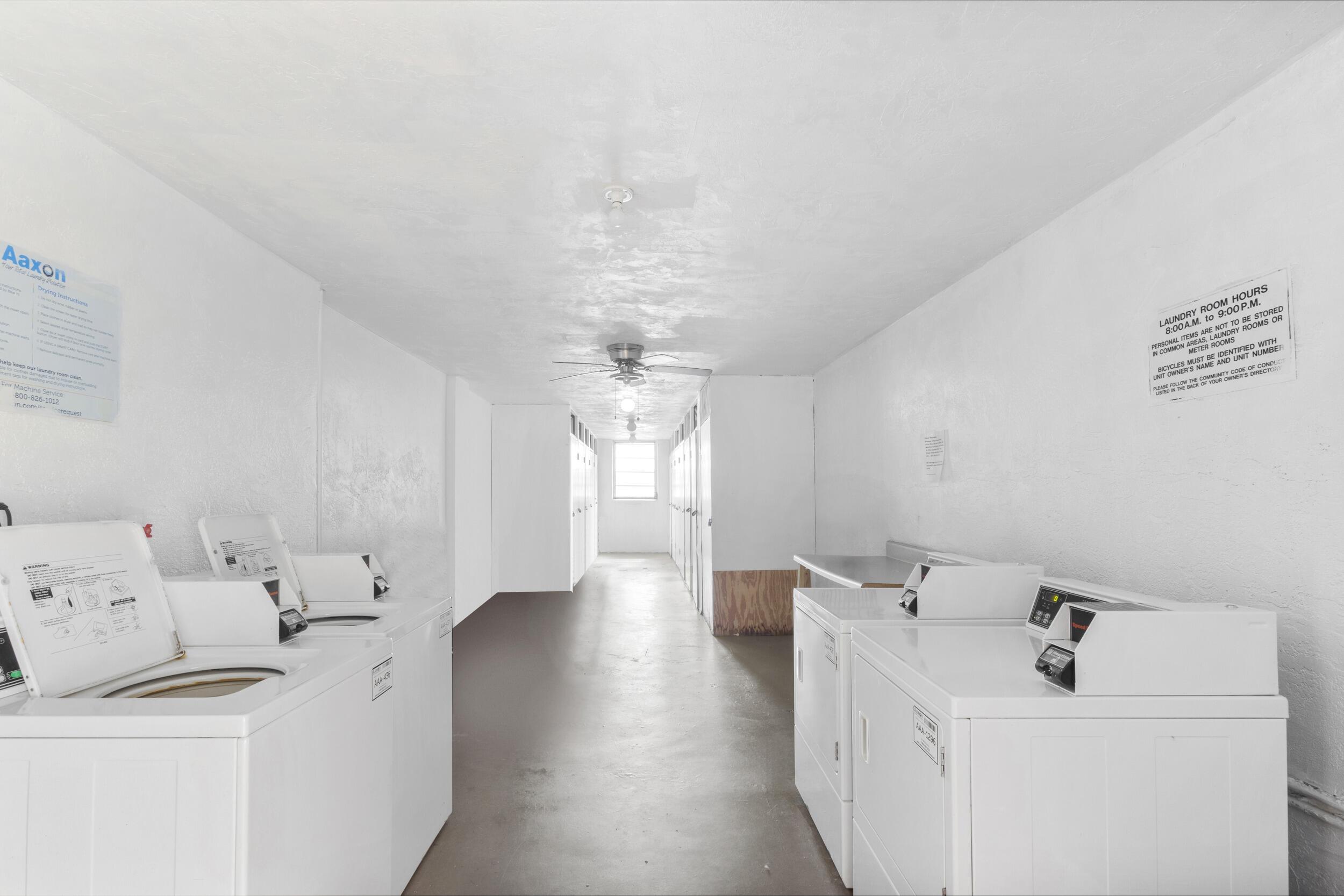 4500 North Federal Highway, Unit 272H Lighthouse Point, FL 33064 - Photo 18 of 30 a view of utility room with washer and dryer