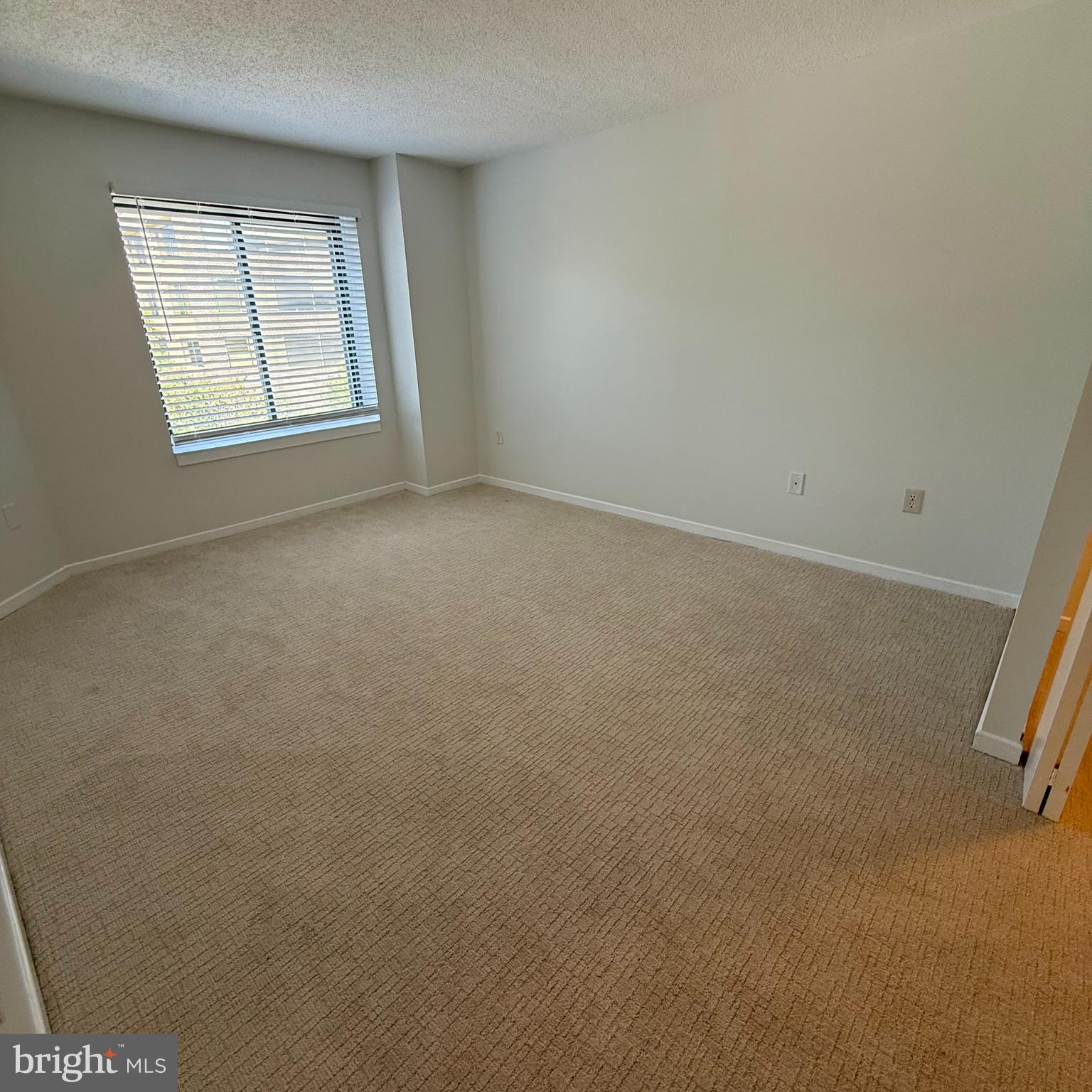 2111 Wisconsin Avenue Northwest, Unit 402 Washington, DC 20007 - Photo 11 of 22 an empty room with windows