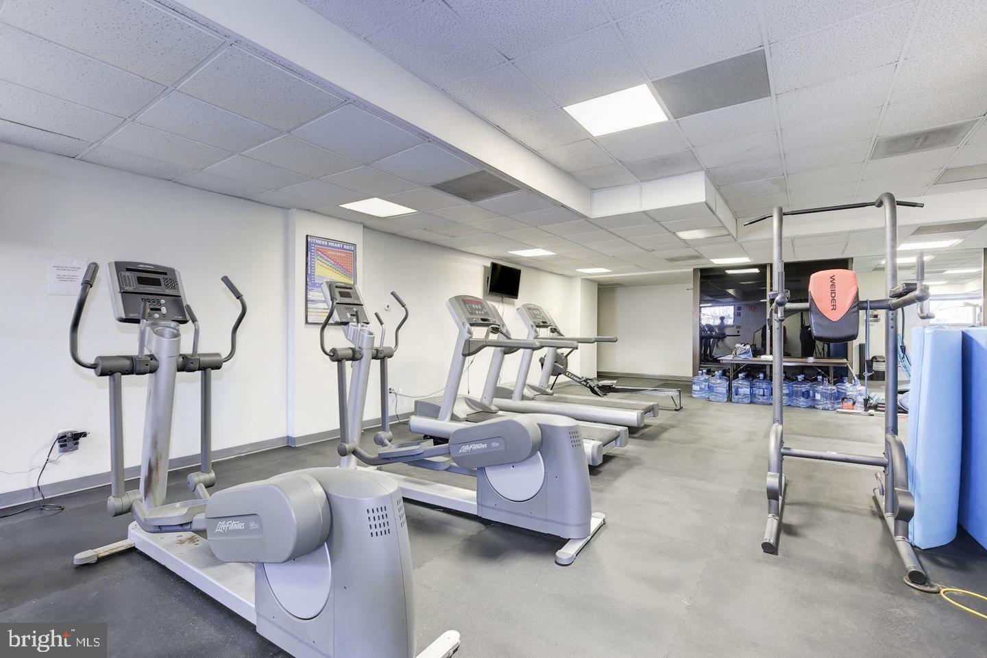 2111 Wisconsin Avenue Northwest, Unit 402 Washington, DC 20007 - Photo 17 of 22 a view of a room with gym equipment