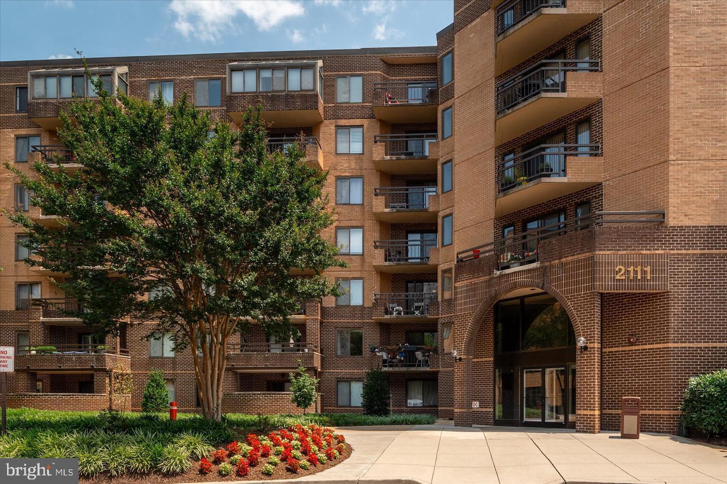 2111 Wisconsin Avenue Northwest, Unit 402 Washington, DC 20007 - Photo 2 of 22 a front view of a building with garden