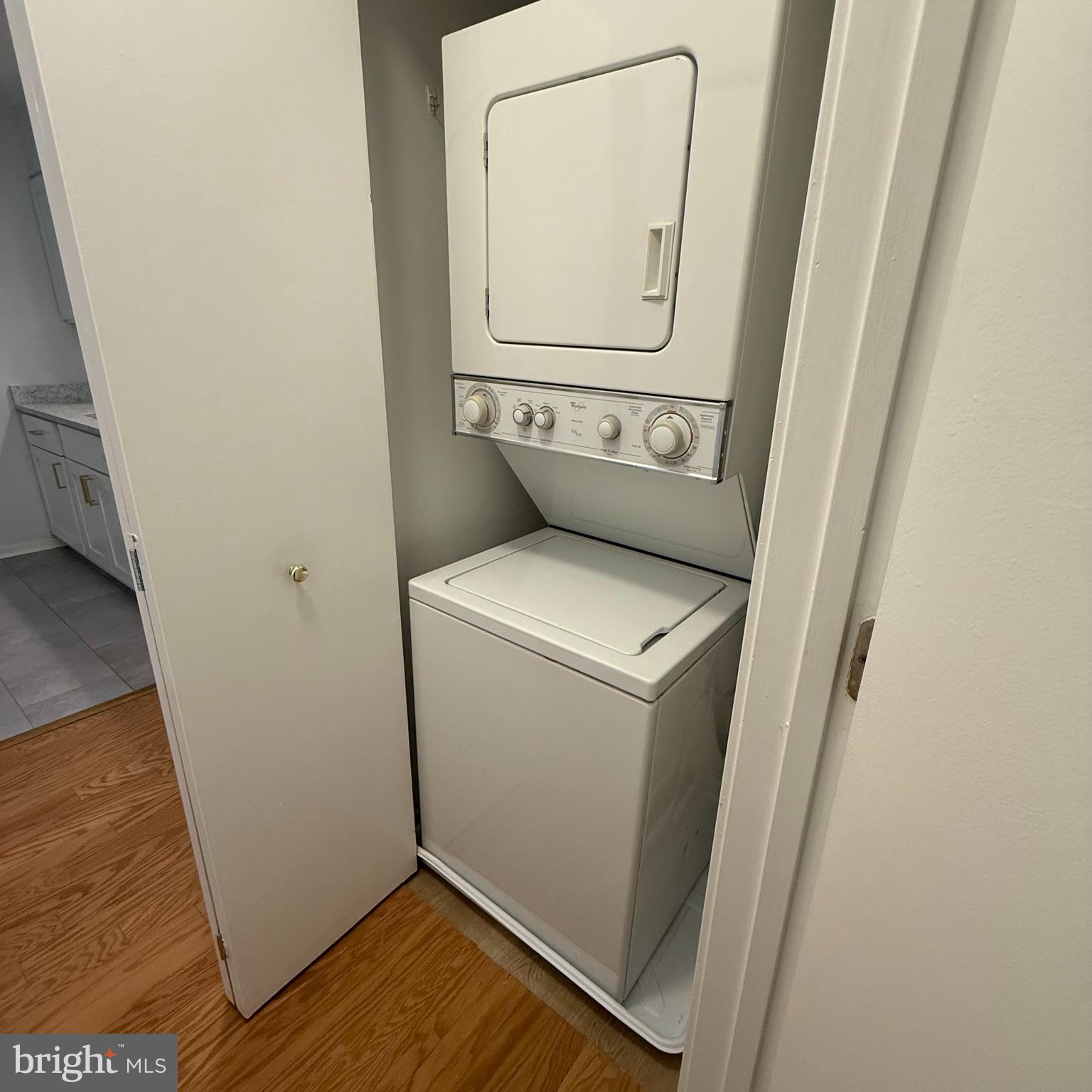 2111 Wisconsin Avenue Northwest, Unit 402 Washington, DC 20007 - Photo 10 of 22 a utility room with dryer and washer