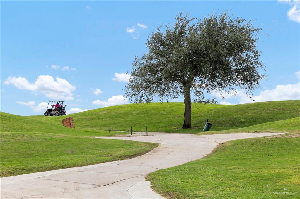 3802 B Shea Weslaco, TX 78596 - Photo 13 of 18 a view of a golf course with a play ground