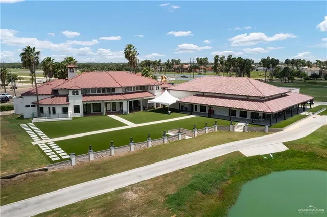 a aerial view of a house with a big yard