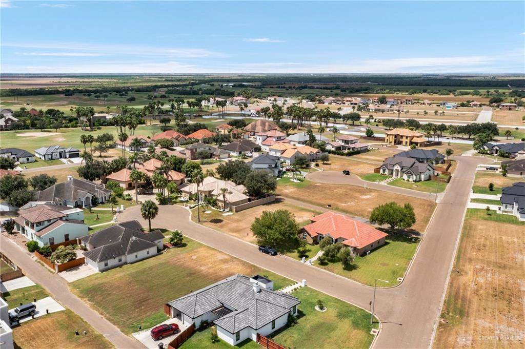 3802 B Shea Weslaco, TX 78596 - Photo 7 of 18 an aerial view of residential building and car parked