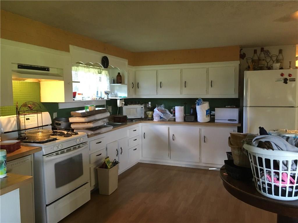 183 Kennedy Road Prospect, PA 16052 - Photo 6 of 15 Kitchen is in the process of being packed up... Please excuse the boxes... As you can see their is plenty of cabinets!
