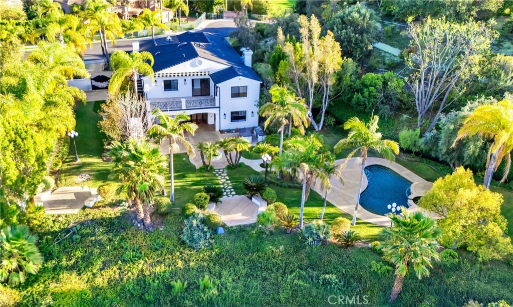 4165 Elm View Encino, CA 91316 - Photo 1 of 49 a flower garden with a flower in a garden