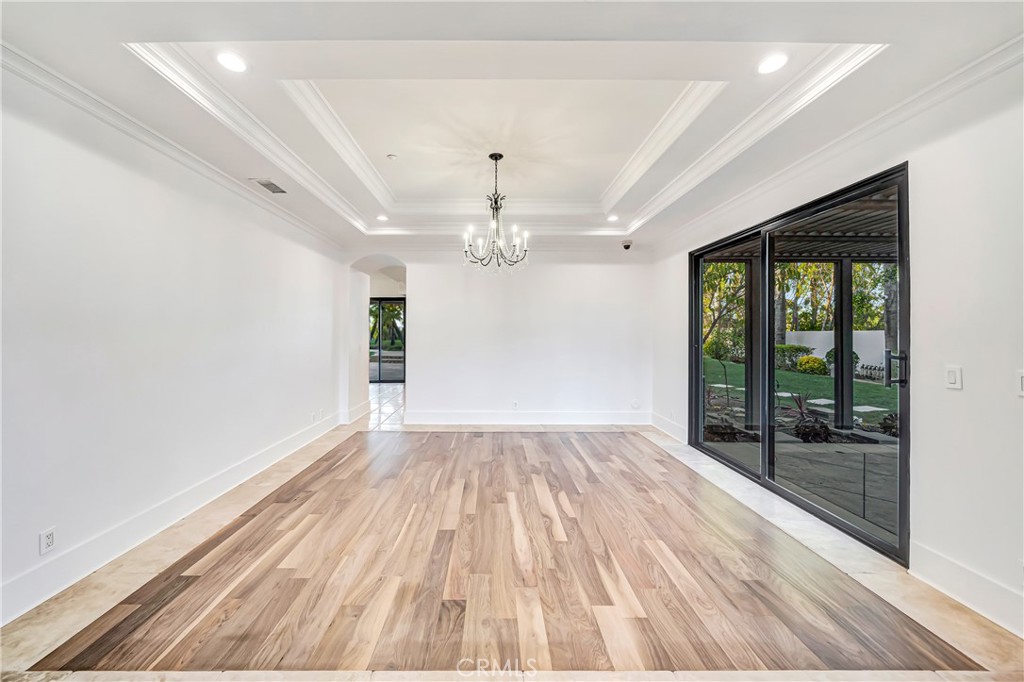 4165 Elm View Encino, CA 91316 - Photo 12 of 49 wooden floor in an empty room with a window