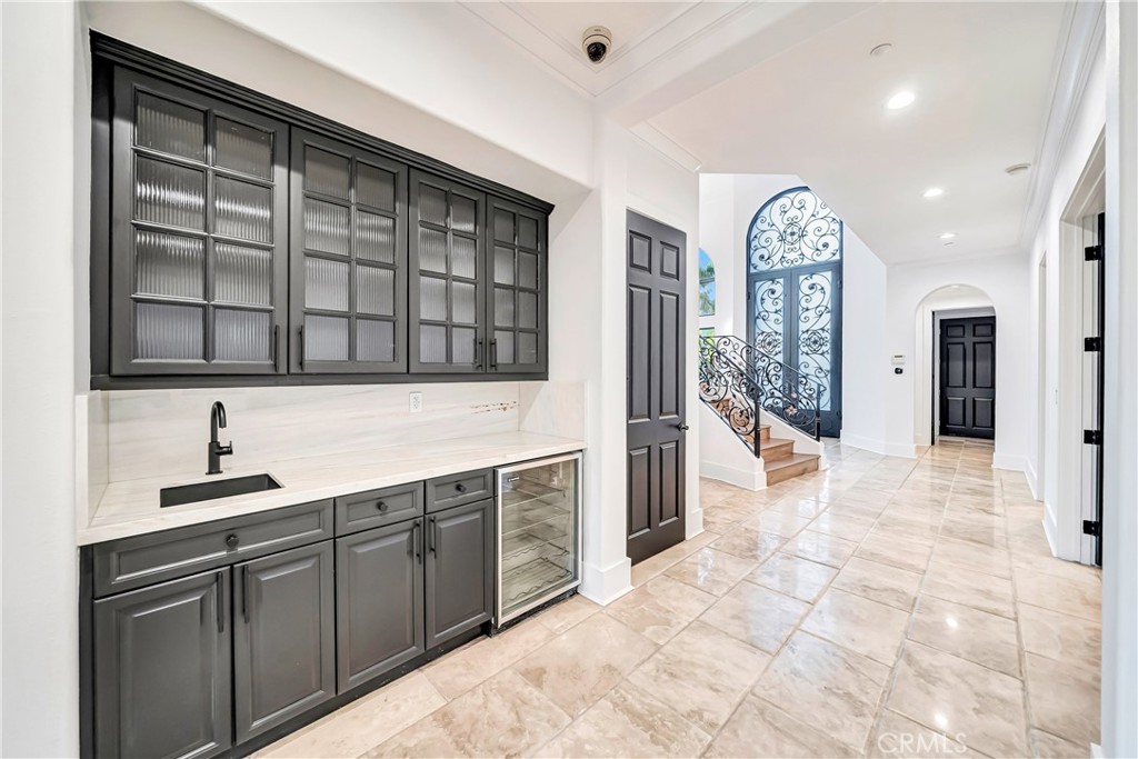 4165 Elm View Encino, CA 91316 - Photo 17 of 49 a view of a kitchen with center island and windows