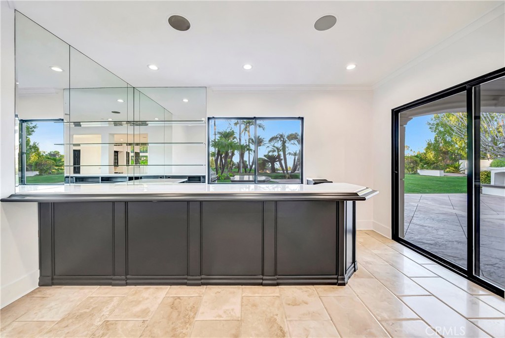 4165 Elm View Encino, CA 91316 - Photo 20 of 49 a kitchen with stainless steel appliances granite countertop a refrigerator and a sink