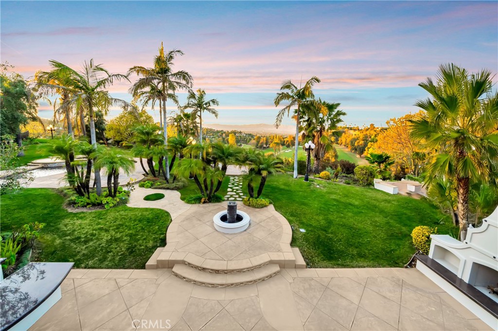 4165 Elm View Encino, CA 91316 - Photo 2 of 49 a view of a garden with a fountain