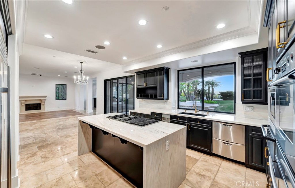 4165 Elm View Encino, CA 91316 - Photo 28 of 49 a kitchen with a stove sink and a refrigerator