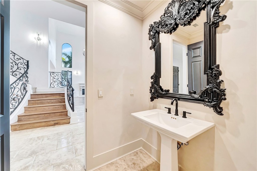 4165 Elm View Encino, CA 91316 - Photo 30 of 49 a bathroom with a sink and a mirror