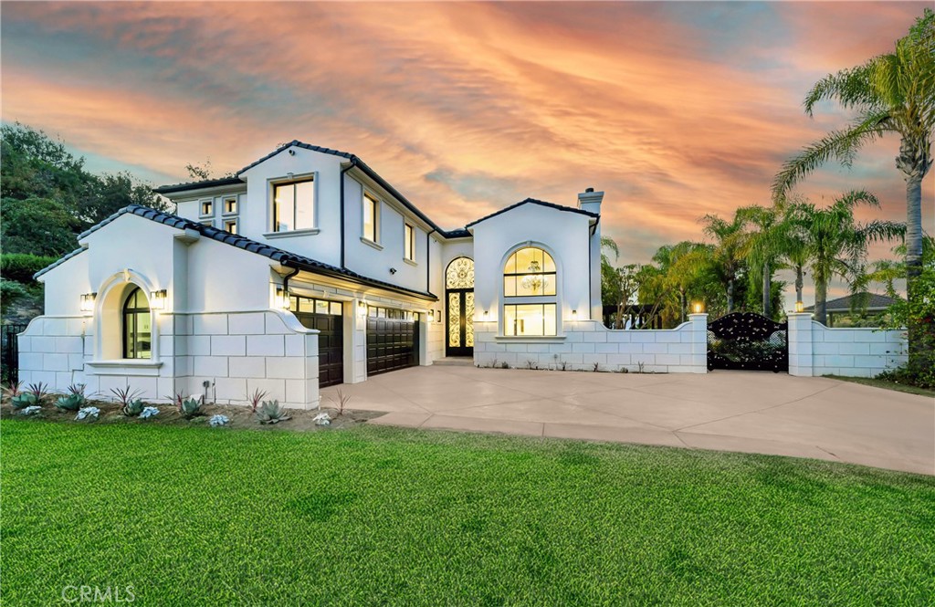 4165 Elm View Encino, CA 91316 - Photo 3 of 49 a front view of house with yard and green space