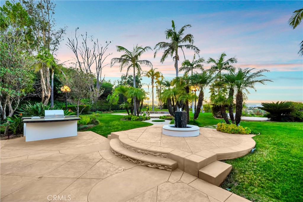 4165 Elm View Encino, CA 91316 - Photo 40 of 49 a view of a garden with palm trees