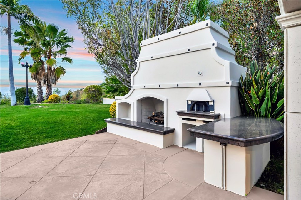 4165 Elm View Encino, CA 91316 - Photo 42 of 49 a view of a kitchen with a sink and a fireplace