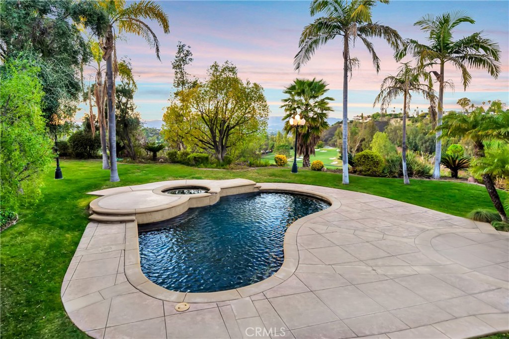 4165 Elm View Encino, CA 91316 - Photo 44 of 49 a view of a backyard with palm trees