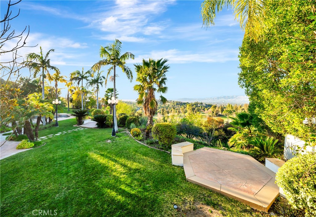 4165 Elm View Encino, CA 91316 - Photo 47 of 49 a view of a yard with palm trees