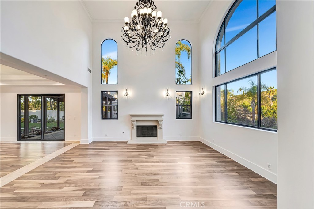 4165 Elm View Encino, CA 91316 - Photo 7 of 49 a view of an empty room with window and wooden floor