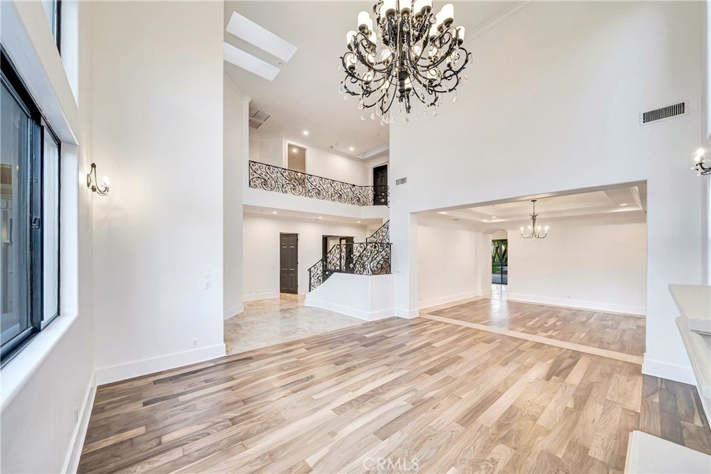 4165 Elm View Encino, CA 91316 - Photo 9 of 49 a view of a livingroom with wooden floor and a chandelier