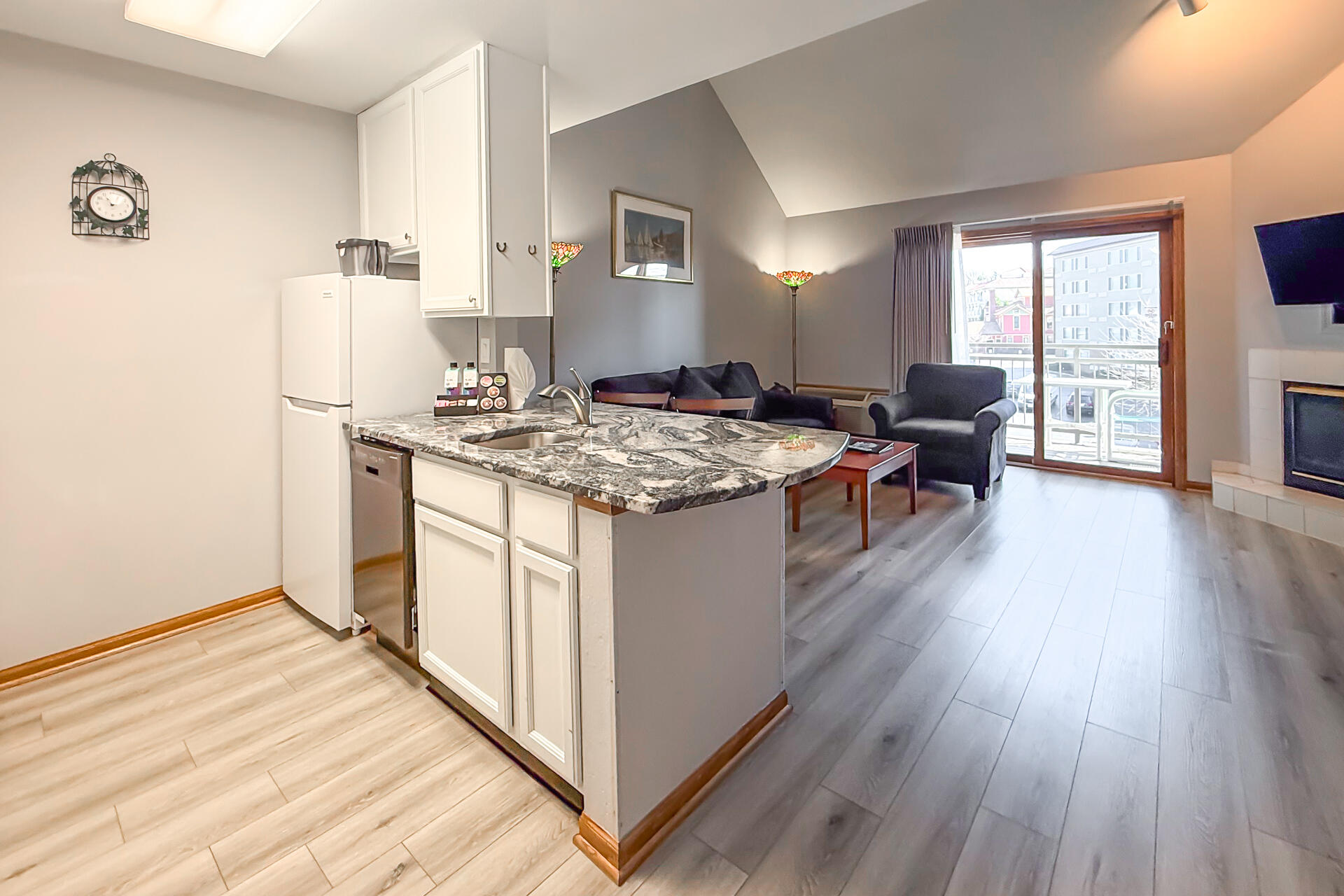 111 Center Street, Unit 403 Lake Geneva, WI 53147 - Photo 6 of 29 Kitchen & Living Room